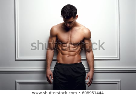 Foto d'archivio: Portrait Of A Shirtless Muscular Man