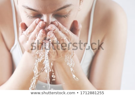 Zdjęcia stock: Young Woman With Cleansing Spray Isolated On White