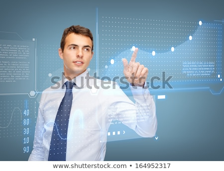 ストックフォト: Young Businessman Pressing Button On Rising Graph