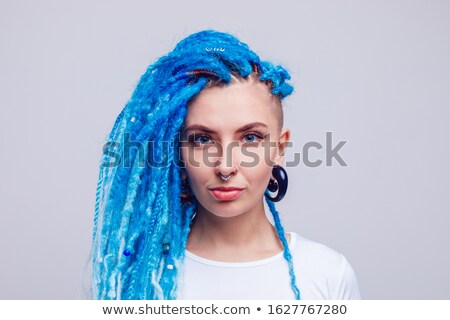 Foto stock: Portrait Of Young Smiling Woman With Dreadlocks