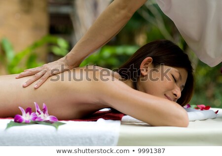 Zdjęcia stock: Asian Woman Having A Massage In Tropical Setting