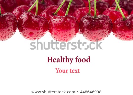 Foto stock: Cherry Background Ripe Fresh Rich Cherries With Tails And Drops Of Water Macro Texture