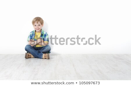 ストックフォト: Children Sitting On Wall Happy Boys Laughing
