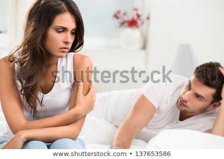 Stock photo: Worried Couple On Bed