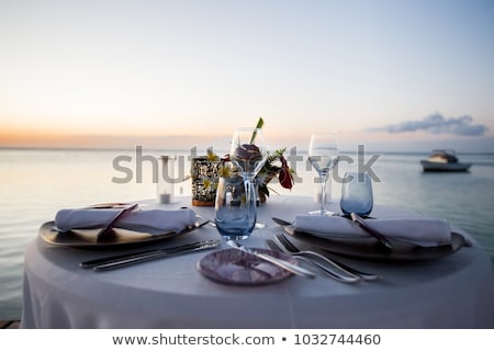 Stockfoto: Couple Dining At Seaside Restaurant