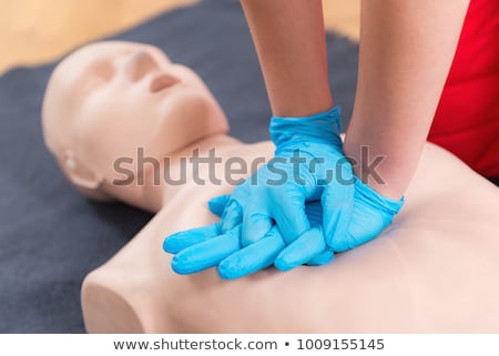 Stock fotó: Paramedic Practicing Cardiopulmonary Resuscitation On Dummy