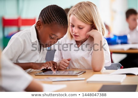 Stock photo: Girl Working On A Computer At Primary School