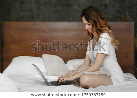 Foto stock: Young Brunette Girl With Her Latop