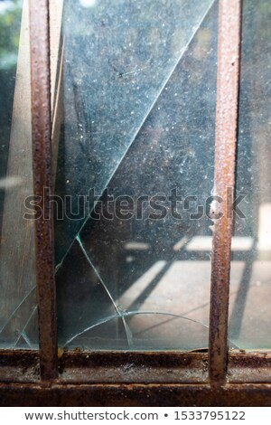 Stockfoto: Shattered Glass Rusty Door Frame