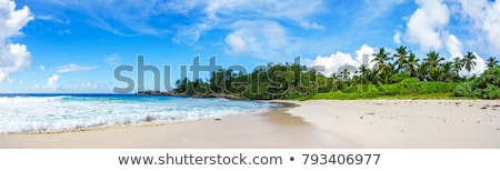 Stockfoto: Tropical Beach Landscape With Rock Formation Island And Ocean