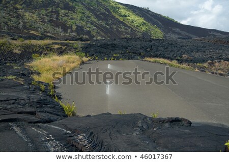 Foto stock: Lava Over The Road - End