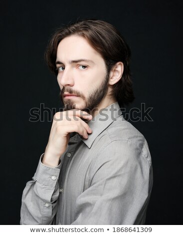 Stock fotó: Unhappy Man With Closed Eyes Touching His Forehead