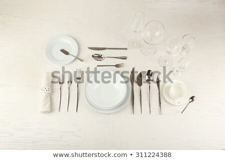 Stock photo: Close Up Of Table Setting With Glasses And Cutlery