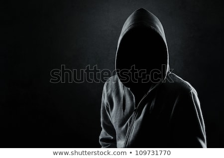 Сток-фото: Hooded Man In The Dark