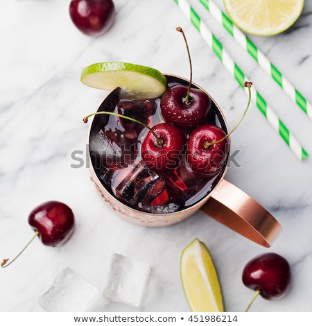 Stockfoto: Cold Cherry Moscow Mules Cocktail With Ginger Beer Vodka Lime Marble Background Top View