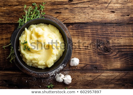 Сток-фото: Mashed Potatoes Boiled Puree In Cast Iron Pot On Dark Wooden Rustic Background Top View