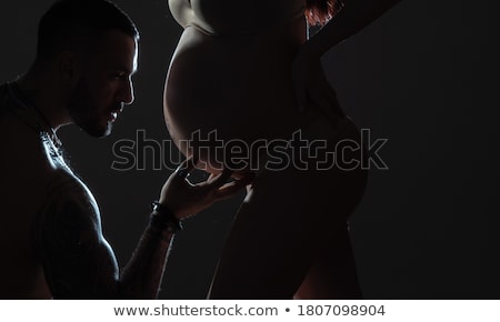 Foto stock: Young Happy Family Is Waiting A Baby