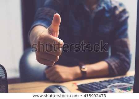 Stockfoto: Happy Business Man Showing The Thumbs Up Sign