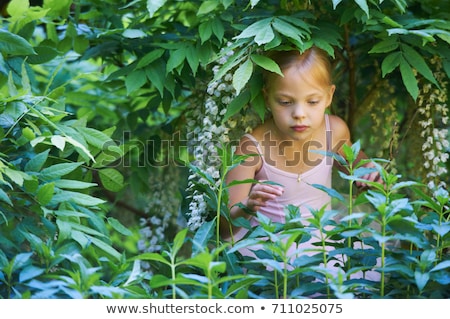 [[stock_photo]]: Girl In Ballet Costume Hiding In Bush