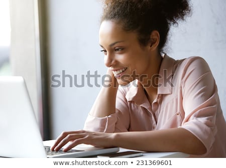 Zdjęcia stock: Happy African Woman With Laptop Computer At Office