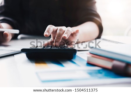 Stockfoto: Professional Businessman Working At Workplace Doing Finance On