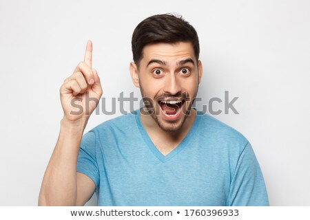 Stock fotó: Young Man Pointing Up Having An Idea