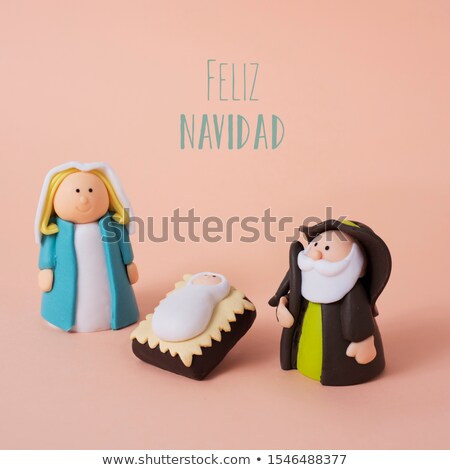 [[stock_photo]]: Holy Family And Text Merry Christmas In Spanish