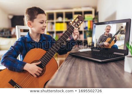 Foto stock: Boy With Guitar