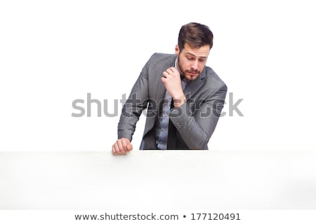 Stockfoto: Young Business Man Looking Down