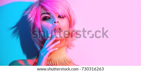 [[stock_photo]]: Profile Beauty Portrait Of A Woman In Pink Light