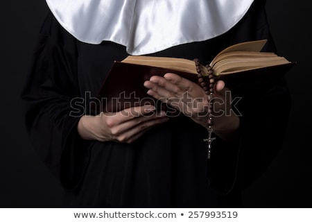 Stock photo: Young Nun In Religious Concept