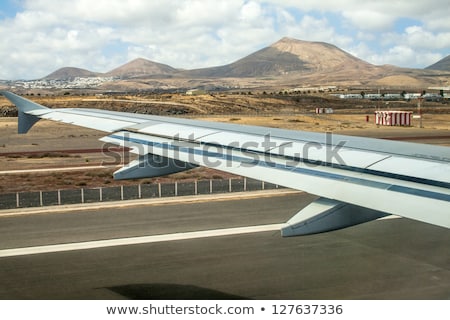 ストックフォト: Takeoff At Airport Of Lanzarote With Volcanoes