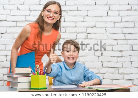 Сток-фото: Pupils And Teacher Showing Thumbs Up In School Having Fun