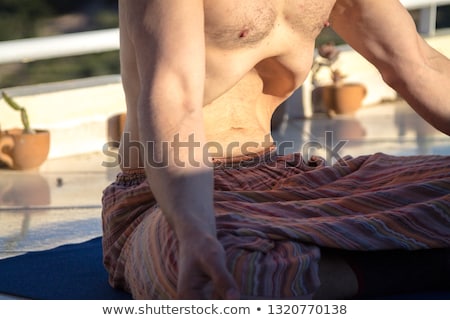 Сток-фото: Man Does Yoga At Dawn