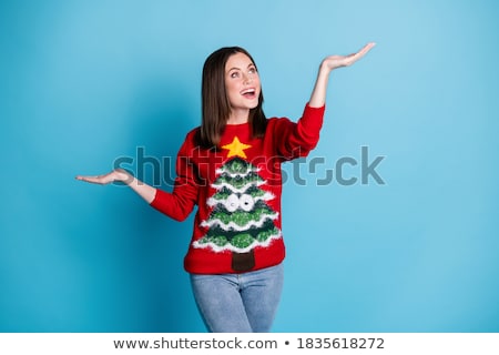 Stock fotó: Woman Holding A Christmas Ornament