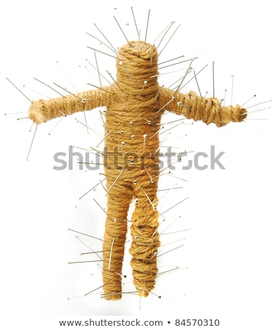 Stock photo: Rope Voodoo Doll With Pin On White