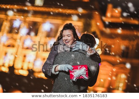 Foto d'archivio: Romantic Young Man Presenting A Valentines Gift