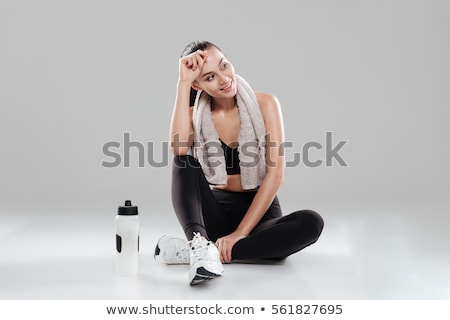 Foto stock: Young Woman In Sports Concept Isolated On The White