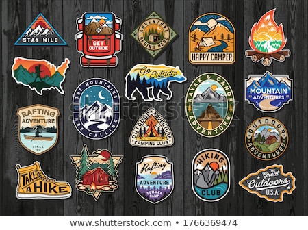 Foto stock: Camping Badge Design Outdoor Adventure Logo With Camp Travel Quote Phrase - Just The Trees And Me