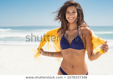 [[stock_photo]]: Beautiful Young Woman On Beach With Scarf