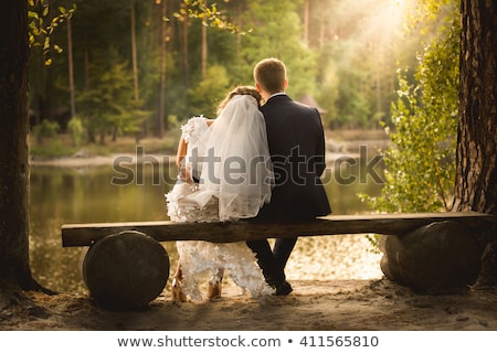 商業照片: Beautiful Wedding Couple Sitting In The Woods