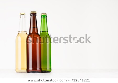 ストックフォト: Group Of Brown Green Transparent Longneck Beer Bottles 500ml Mock Up