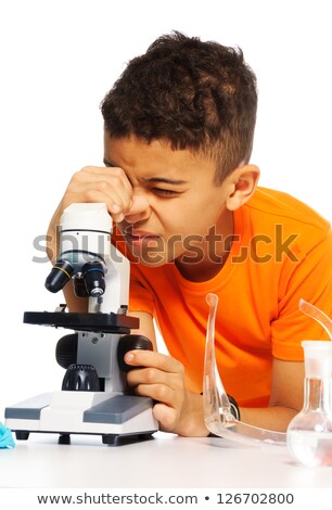 Stockfoto: Little Boy Using Microscope