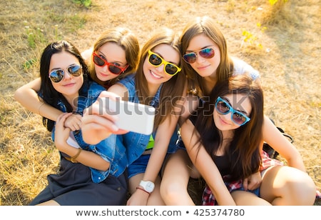 Stock fotó: Friends Taking Selfie By Smartphone And Hugging