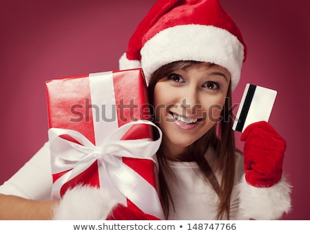 Foto stock: Beautiful Mrs Santa With A Gift Box