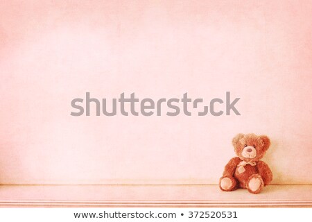 Stockfoto: Pink Teddy Bear Toy Alone On Wood In Front Brown Background