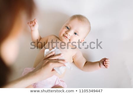 Stock photo: Momy Cleaning Baby Skin With Wet Wipes