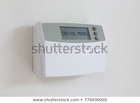 Foto stock: Vintage Digital Thermostat - Covert In Dust - Saving Money