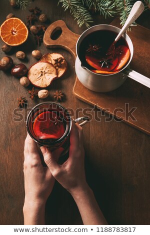 Stock photo: Crop People Holding Warm Punch