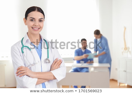 Stok fotoğraf: Young Female Doctor Or Nurse